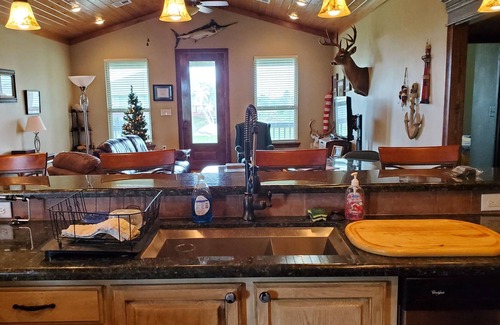 Hackberry House | Wonderful Bayhouse In Anglers Bay Subdivision on Canal,4 bedroom,2 baths, deck