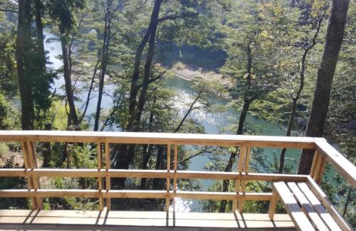 Pucon House | Wonderful rustic cabin 2, with native logs, on the banks of the Trancura River