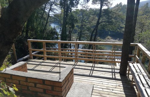 Pucon House | Wonderful rustic cabin 2, with native logs, on the banks of the Trancura River