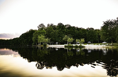 Reeders Cabin | Woodside Cabin, tucked in a circle of towering white pine and mountain laurel.