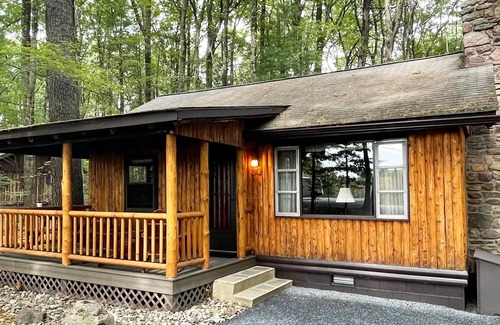 Reeders Cabin | Woodside Cabin, tucked in a circle of towering white pine and mountain laurel.