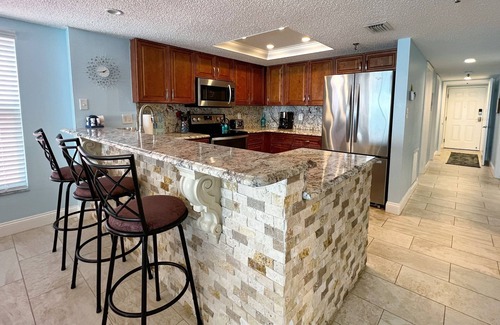 North Redington Beach Condo | XL Family Sized Beachfront on Redington Beach! Huge Pool and Hot Tub!