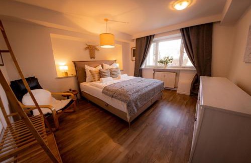 Aufham Apartment | Yello Homes - Gemütliche und luxuriöse Wohnung - mit Sauna, Garten, und Heimkino für 6 Personen