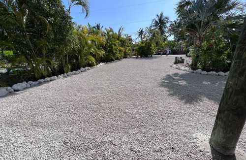Bay Point House | Your own Private Resort! 50ft Dock on Canal w/Pool, Tiki and RV Hookup!