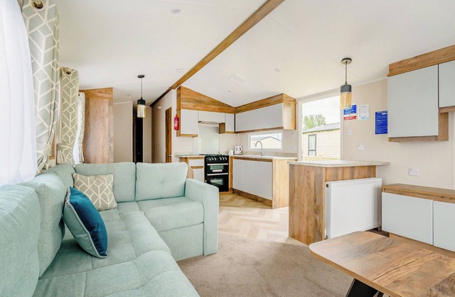 12ft-wide luxury caravan with one double and two twin.
