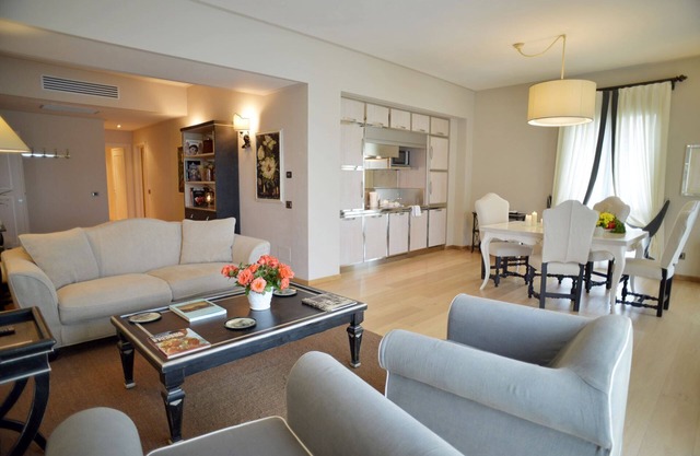 1700 square feet, 2 bedrooms, one with extra bed 2 bathrooms, kitchen & living