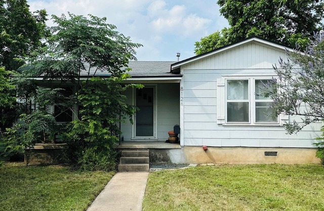 2-3 BR house with big fenced yard & private carport