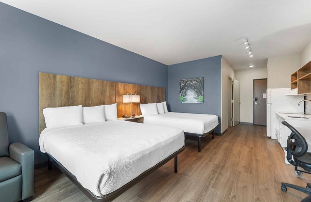 2 Beds Room - Enjoy Complimentary Breakfast at Our Homely Suites with Kitchens