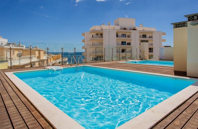 2BDR W/AC & Pool -2min from beach- by LovelyStay