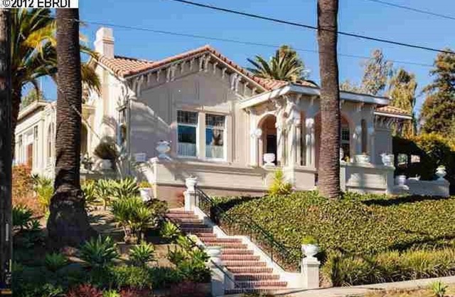 3,200 sf in best area. Towering Palm Trees Outside. Gorgeous Original Art Inside