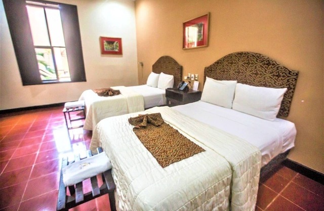3-Stay, 2 Double Rooms: Colonial Charm in Central Mérida – Perfect Base