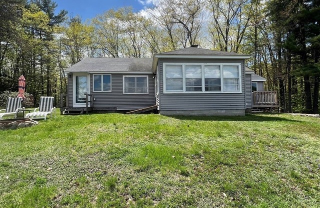 4 bedroom 1 bath. Large Yard, Short walk to public beach.