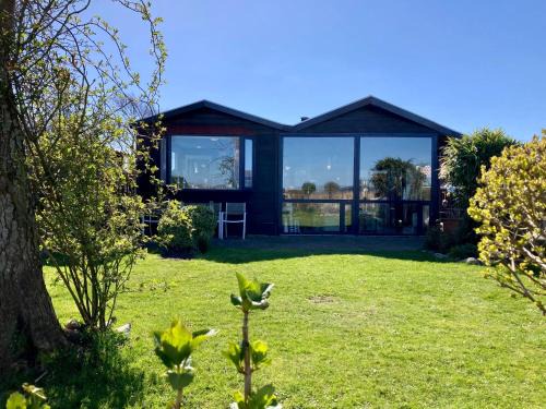 6 pers House Marijke with winter garden and direct access to the Lauwersmeer