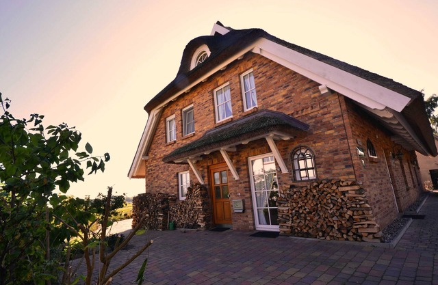 8a Reet-house part Sonnenkliff OG 3 bedrooms - Thatched-roof vacation apartments 8 Kröning