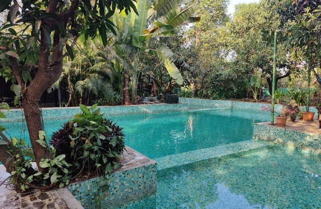 90 min. from Bandra, Stylish Eco-Villa in orchard w. amazing poolscape