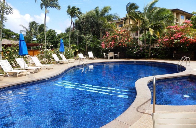 A/C throughout spacious clean comfortable main floor condo with lush garden view