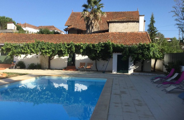 A converted farmhouse with private swimming pool and courtyard.