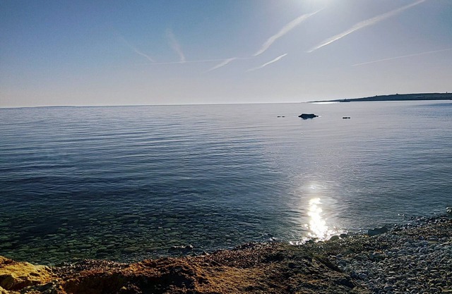 A few steps from the white beach, crystal clear sea
