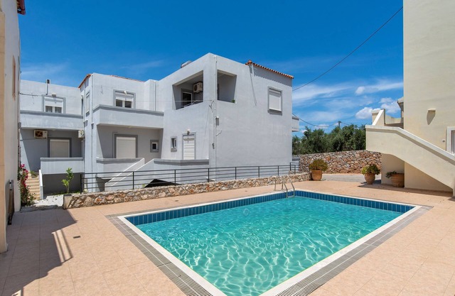 A house in Almyrida with a communal pool