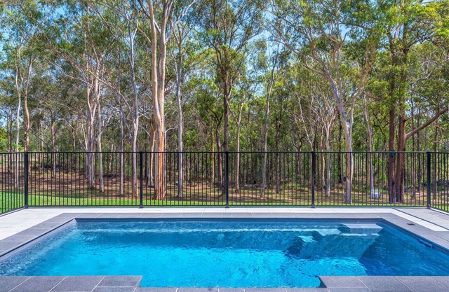 A tranquil bushland retreat with KB, Ducted AC and access to a heated pool.