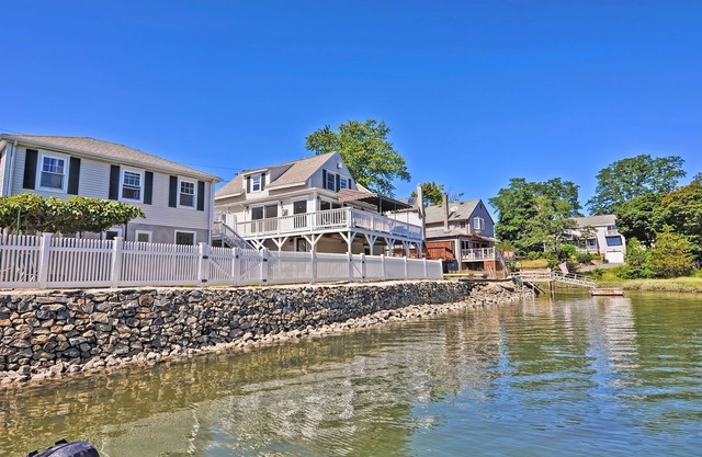 Afternoon Delight: Toast the beauty of the river from the waterfront deck
