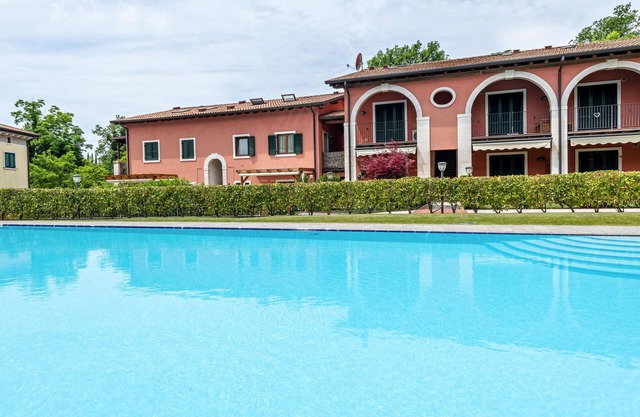 Apartment 'Residence Corte La Fiorita' with Shared Pool, Wi-Fi and Air Conditioning