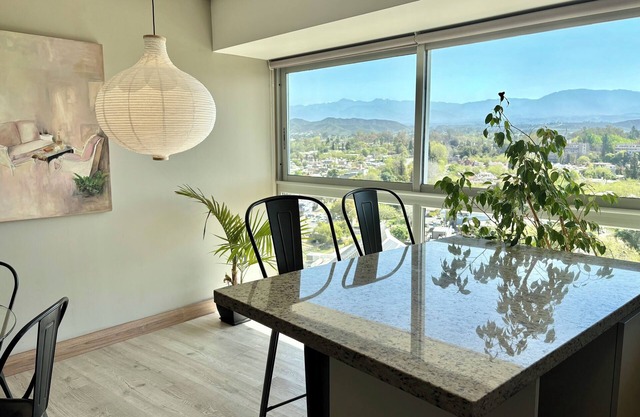 APARTMENT WITH CITY AND MOUNTAIN/POOL VIEW