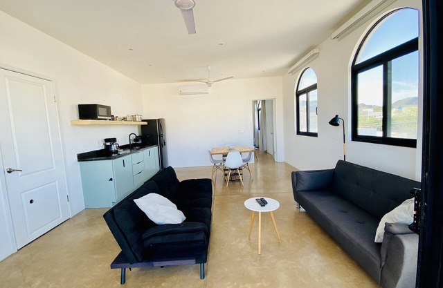 Apartment with mountain view, private balcony and access to beach front terrace.