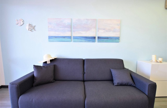 App. With large terrace and parking space, 350 m from the beach