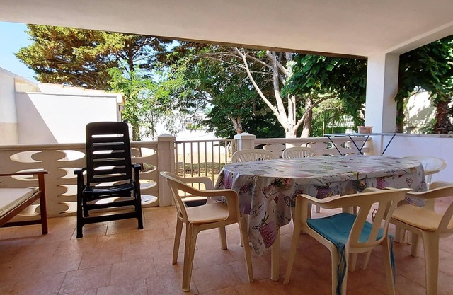 Beach Front Ground Floor Holiday House with Private Garden 30 m from the sea