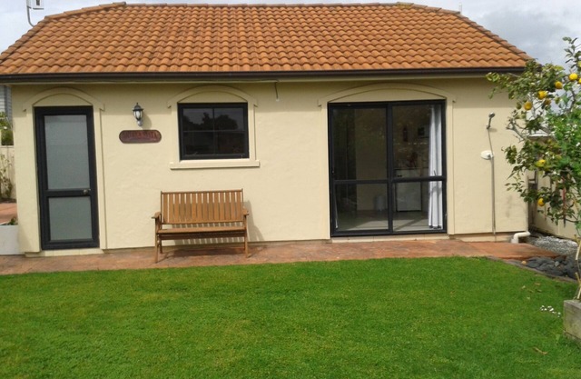 Beach Studio with King size bed, a bathroom and kitchen, off street parking