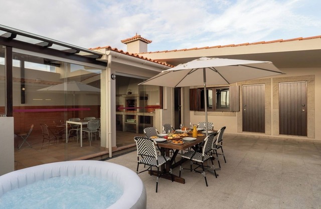 Beach Villa with Jacuzzi and Garage by HostWise