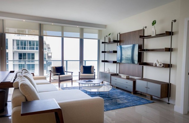 Beachfront 2BR Retreat with Stunning Ocean Views