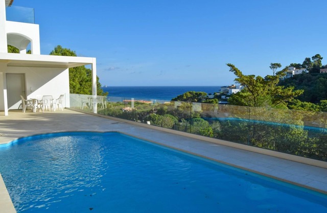 Beachside detached villa, sea views, pool ,broadband and A/C