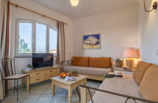 Beautiful apartment for 4 people with A/C, WIFI, pool, TV, terrace, pets allowed and parking