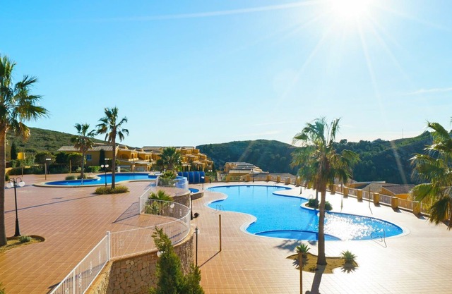Beautiful apartment for 4 guests with pool, A/C, WIFI, TV, patio and parking