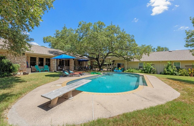 Beautiful Pool home on 2.5 acres with a serene country feel with urban location