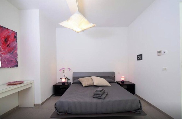 Bed and Breakfast Loggia degli Artisti 'Quadruple Deluxe Room' with pool and air conditioning