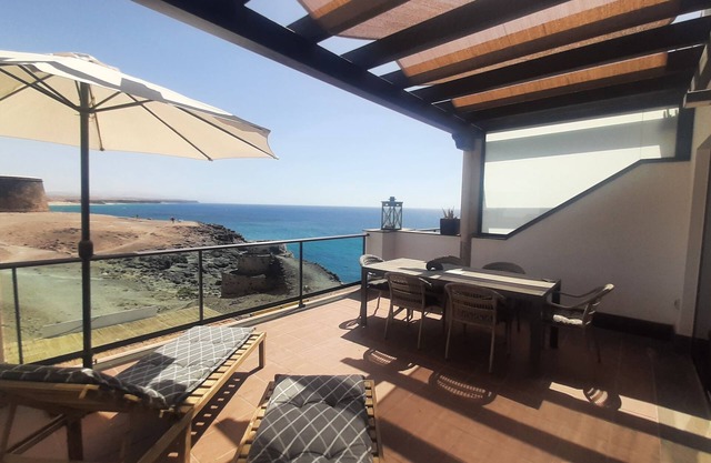 Best location on 2 floors (with penthouse) directly by the sea. Dream view from 3 terraces