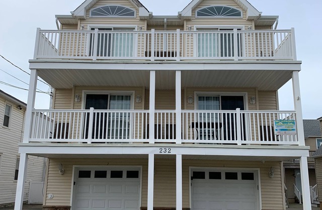 BIG 4 BEDROOM, 2 BATH BEAUTY ! ONLY 1.5 BLOCKS TO THE BEACH AND BOARDS !