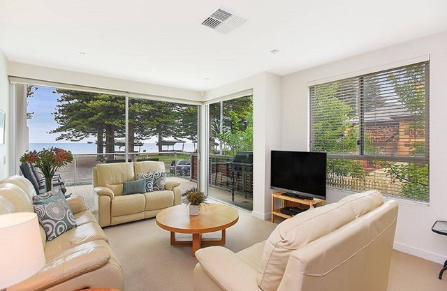 Breeze Beachfront Apartment 1: Ocean Views and Convenient Ground Floor Access!