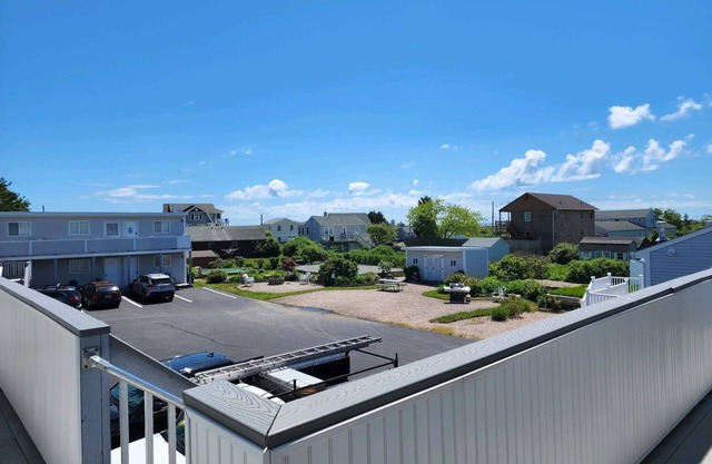 Bright Condo only a short walk to 3 private beaches