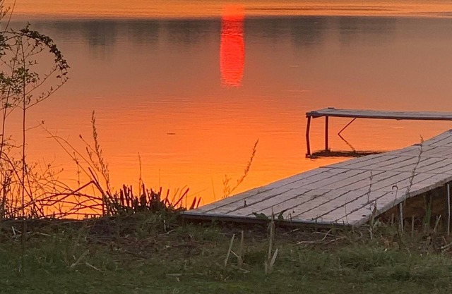 Camp Lake Vacation Home with game room , fishing boat and paddleboat included!