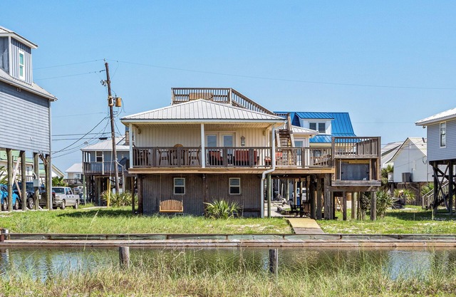 Canal front home with private pool! A block away from beach!