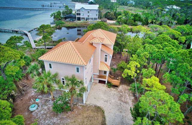 Canary on the Bay - Luxury Bayfront Home, Pet-Friendly, with Private Pool & Dock