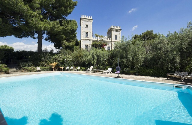 Castle near the sea with pool, park and views