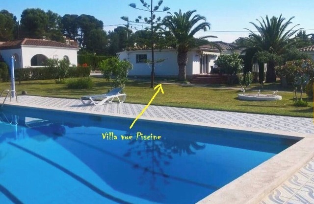 Chalet located on a wooded park of 8000m ² with large community pool, .