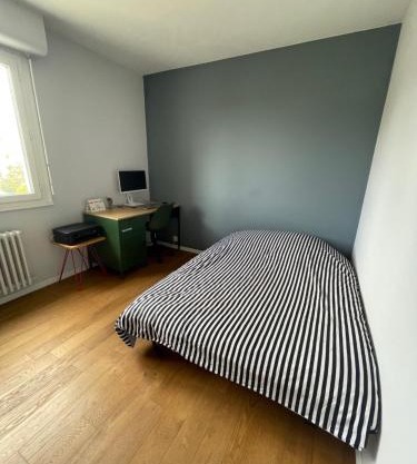 Chambre privée chez l'habitant avec accès à des espaces partagés