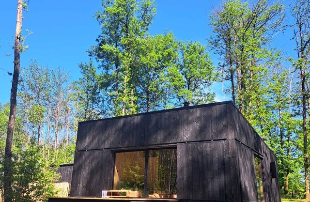 Charming chalet in Sainte-Foy-de-Longas nestled in a private woodland forest