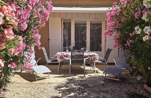 Charming little house in residence with swimming pool.